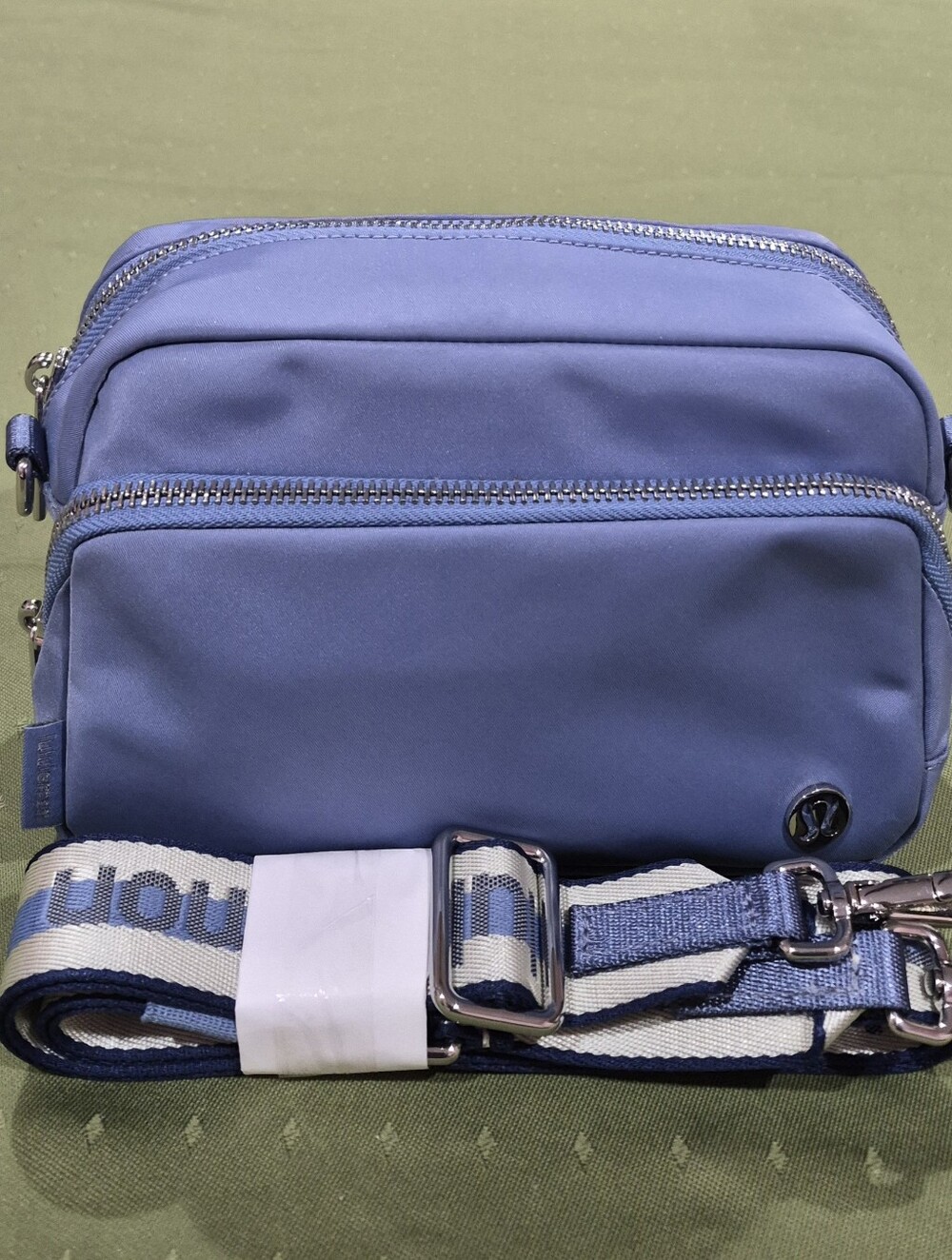 Lululemon Blue/Stripe Monogram Logo on Strap Crossbody bag, Volume 2L.